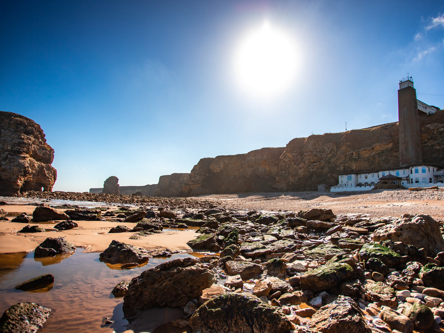 #136 Marsden Bay, rock and grotto.